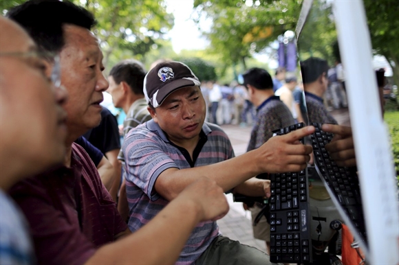 Nha dau tu chung khoan Trung Quoc: Anh la ai?