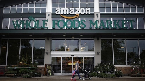 Công ty thương mại điện tử hàng đầu thế giới Amazon mua lại chuỗi bán lẻ ngoại tuyến Whole Food. Ảnh: Infopedia24.