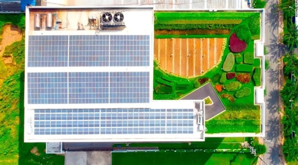 DBW from the air. The roof is fitted out with solar panels and a garden, and is painted with light-reflecting paint.