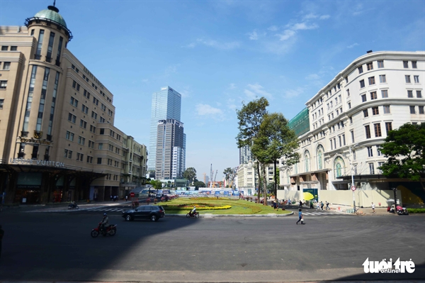 The construction site for a downtown terminal of the metro line No. 1 project has been cleared for a green space opposite the Municipal Theater in District 1, Ho Chi Minh City, Vietnam. Photo: Quang Dinh / Tuoi Tre