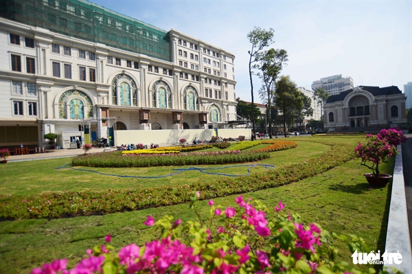 The construction site for a downtown terminal of the metro line No. 1 project has been cleared for a green space opposite the Municipal Theater in District 1, Ho Chi Minh City, Vietnam. Photo: Quang Dinh / Tuoi Tre