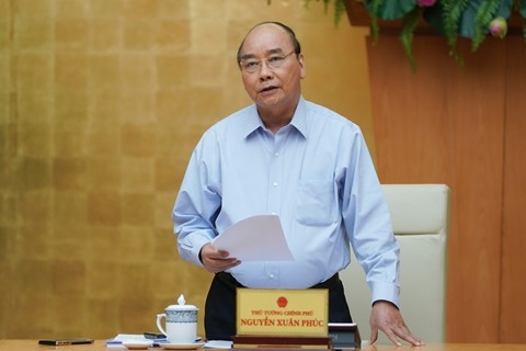 Vietnam vows initial victory against COVID-19 outbreak Prime Minister Nguyen Xuan Phuc presides over a meeting on COVID-19 prevention and control in Ha Noi on April 28, 2020. Photo: VGP