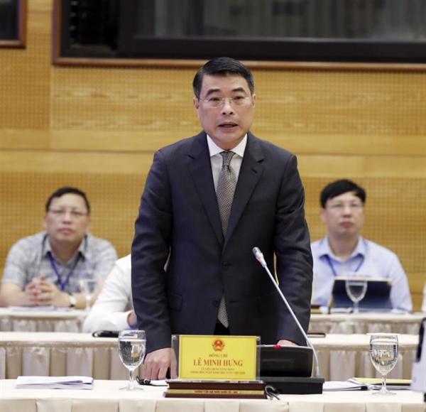 State Bank of Vietnam's Governor Le Minh Hung seen at the online meeting. Photo: Vietnam News Agency 