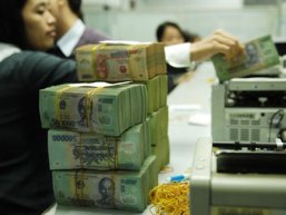 Standard Chartered dự báo Việt Nam giảm 0,5% lãi suất trong quý này