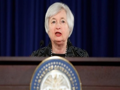 Fed hạ dự báo tăng trưởng kinh tế Mỹ, đẩy nhanh lộ trình nâng lãi suất từ năm 2015