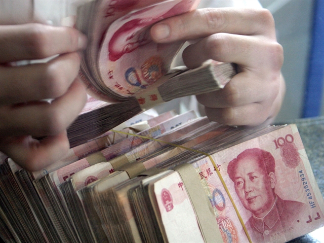 Trung Quốc tăng tỷ giá mạnh nhất 4 tháng