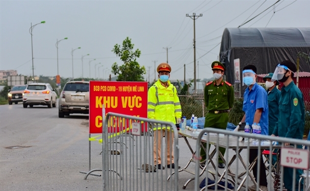 Vietnam’s capital city puts 11,000 residents of a village under lockdown