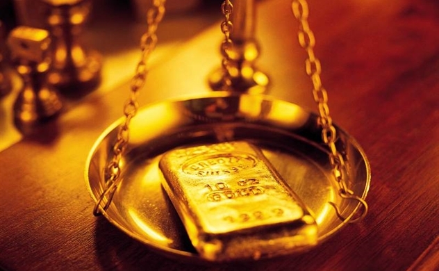 Ngày 6/10: Đồng USD bật tăng mạnh khiến giá vàng toàn cầu đảo chiều