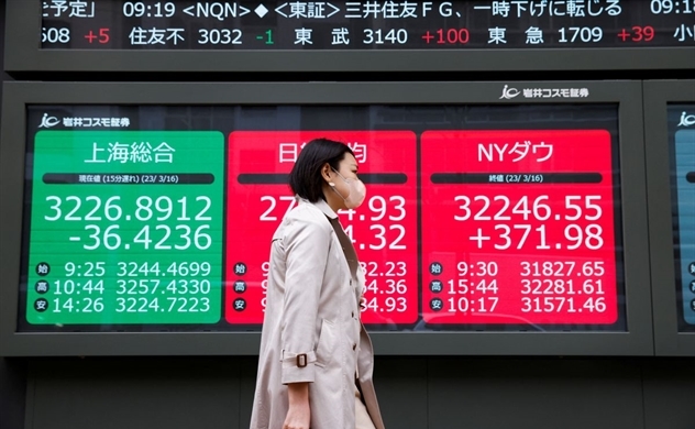 Asian markets take breather from banking turmoil, capping tumultuous week