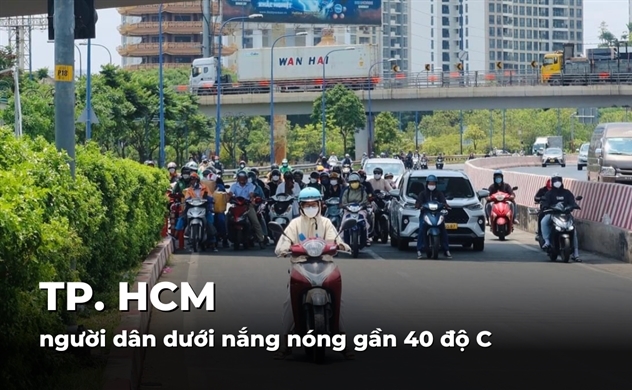 TP.HCM, người dân dưới nắng nóng gần 40 độ C