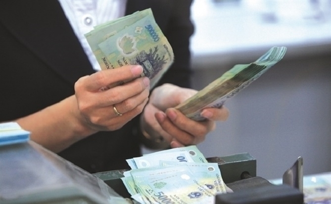 Mặt bằng lãi suất rục rịch tăng trước sức ép tỉ giá và nhu cầu vốn cuối năm